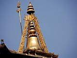 03 Kathmandu Gokarna Mahadev Temple Very Top Has A Trident, Bell, Canopy and Bird
